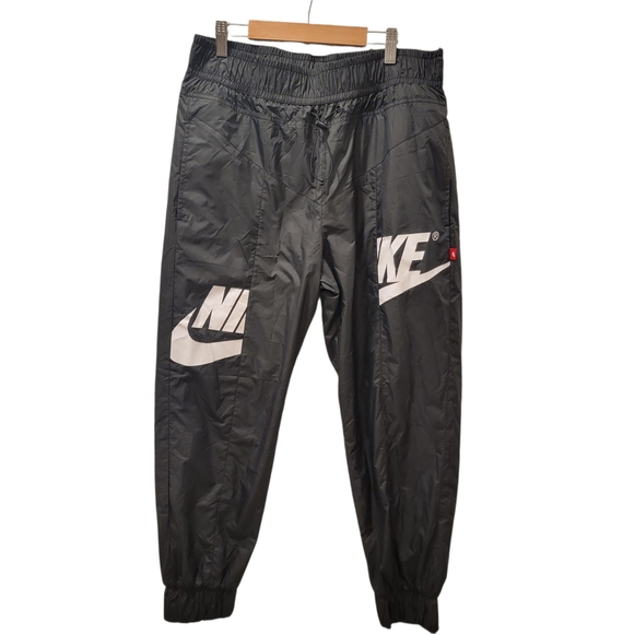Women's Nike Black Windbreaker Wind runner Jogger Pants Size Medium - Picture 1 of 13